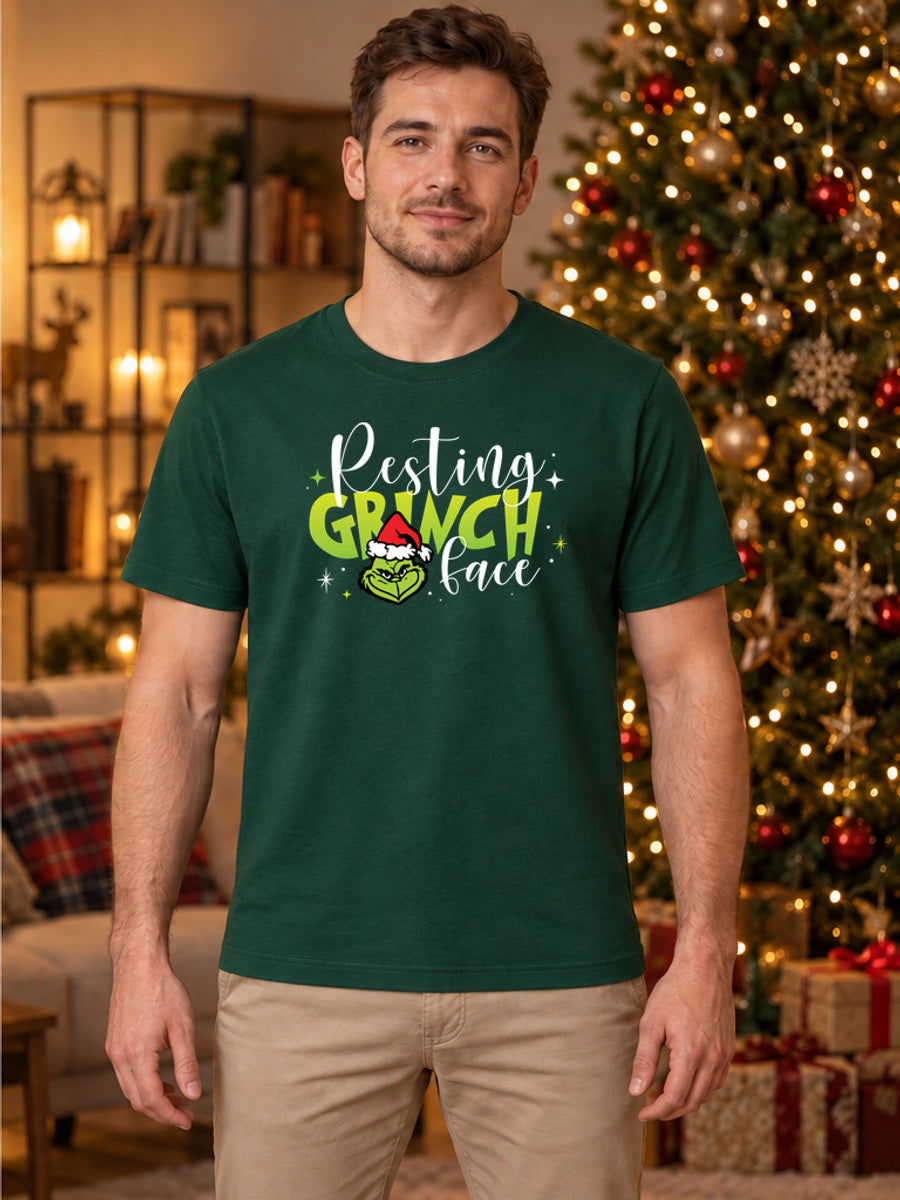 Tricou de Crăciun Resting Grinch Face - Bottle Green - tricou unisex pe model masculin, decor de Crăciun (mockup V3)